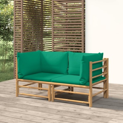 Sofás esquineros de jardín 2 uds bambú con cojines verde